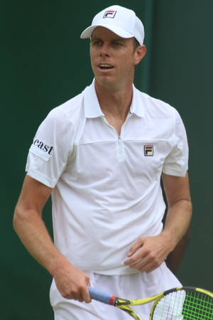 Intense Focus - Professional Tennis Player Sam Querrey In Action Wallpaper