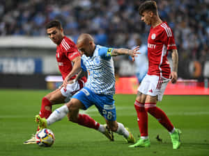 Intense Football Match Action Wallpaper