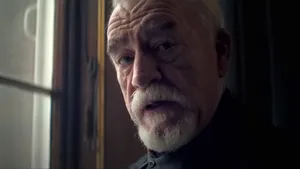 Intense Gaze Man Portrait Wallpaper