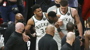 Intense Nba Final Moments: Players Giving It All For The Championship. Wallpaper