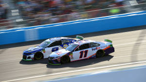 Intense Racing Moment With Denny Hamlin Wallpaper