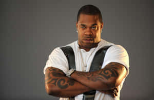 Intense Rapper Pose Studio Shot Wallpaper