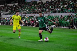 Intense Soccer Match Action Wallpaper