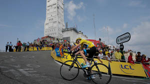 Intense Uphill Challenge At The Tour De France Wallpaper