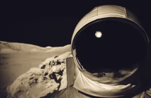 Intrepid Astronaut Exploring The Cosmos Wallpaper