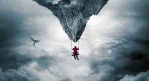 Inverted_ Mountain_ Swing_ Surreal_ Scene.jpg Wallpaper