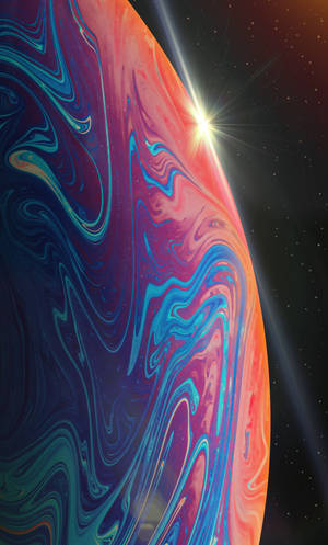 Iphone 13 Ios Purple Planet Wallpaper