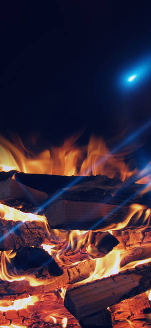 Iphone Wood Fire Blue Lights Wallpaper