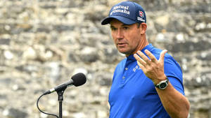 Irish Golfer Padraig Harrington Delivering A Speech Wallpaper