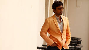 Irrfan Khan Orange Suit Wallpaper