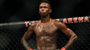 Israel Adesanya In Cage Wallpaper