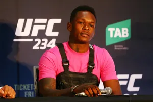 Israel Adesanya In Press Conference Wallpaper