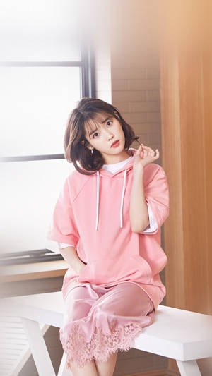 Iu In Pastel Pink Outfit Wallpaper