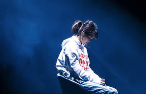 Iu Nodding On Dark Blue Wallpaper