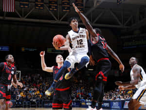 Ja Morrant Being Guarded By The Other Player Wallpaper