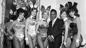 Jackie Wilson - Legendary American Singer Posing With Playboy Bunnies Wallpaper