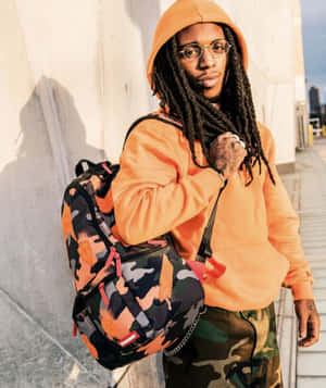 Jacquees Stylish Orange Photoshoot Wallpaper
