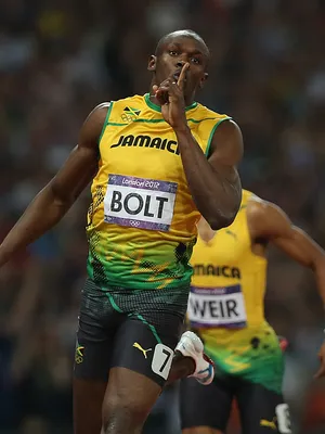 Jamaican Athlete Usain Bolt Raising Finger Wallpaper