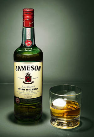 Jameson Whiskey Bottle And Glass Wallpaper