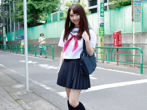 Japanese School Girl Poses Wallpaper