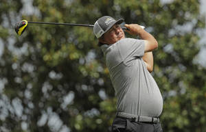 Jason Dufner Swinging Over His Shoulders Wallpaper