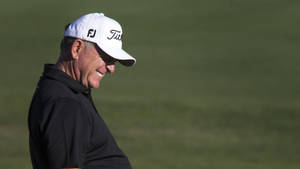 Jay Haas Smiling During A Golf Event Wallpaper