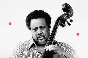 Jazz Legend Charles Mingus Mastering The Bass Wallpaper