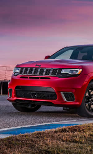 Jeep Trackhawk Under Pink Sky Wallpaper