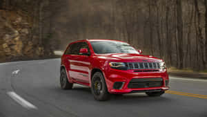 Jeep Trackhawk With Trees Wallpaper