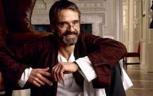 Jeremy Irons On Floor Wallpaper