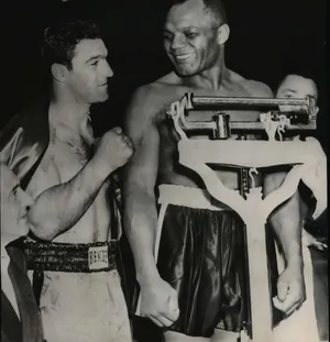 Jersey Joe Walcott And Rocky Marciano's Weigh In Wallpaper