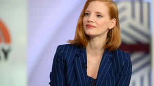 Jessica Chastain Radiant In Red Wallpaper