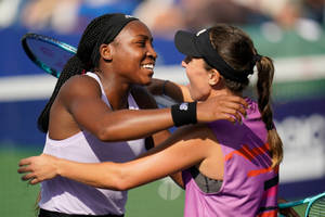 Jessica Pegula Embracing Coco Gauff After A Match Wallpaper