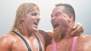 Jim Neidhart Laughing With Owen Hart Wallpaper
