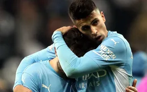 Joao Cancelo Embracing Wallpaper