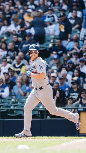 Joc Pederson Smiling While Jogging Wallpaper