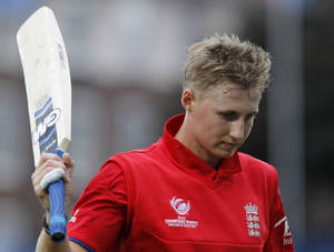 Joe Root In Orange Wallpaper