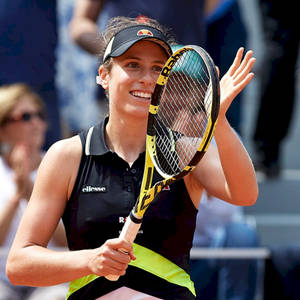 Johanna Konta Applauding Crowds With Tennis Racket Wallpaper