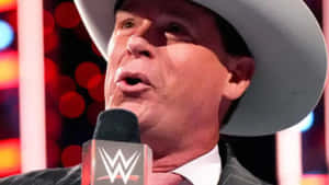 John Bradshaw Layfield In His Distinctive Cowboy Hat, A Pivotal Figure In Wwe History. Wallpaper