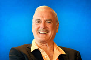 John Cleese Smiling Portrait Wallpaper