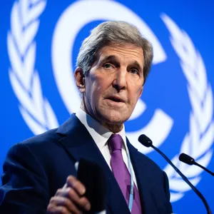 John Kerry Delivering A Speech At The Cop26 Climate Summit Wallpaper