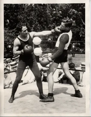Johnny Dundee Tries To Do Uppercut Blow Wallpaper