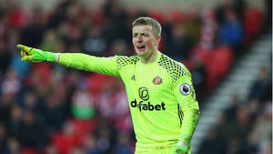 Jordan Pickford Dazzles In Neon Uniform Wallpaper