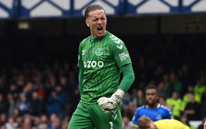 Jordan Pickford Yelling In Green Wallpaper