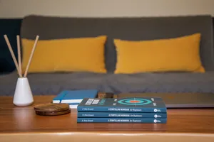 Journals On Living Room Table Wallpaper