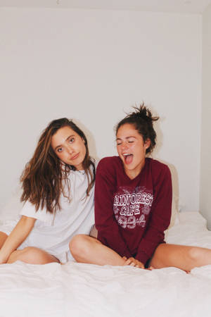 Joyful Besties During A Sleepover Photoshoot Wallpaper