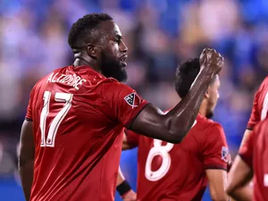 Jozy Altidore Celebrating A Goal With A Fist Pump Wallpaper