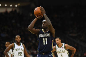 Jrue Holiday Shoot Stance Wallpaper