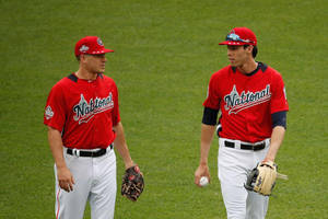 Jt Realmuto Talking To Teammate Wallpaper