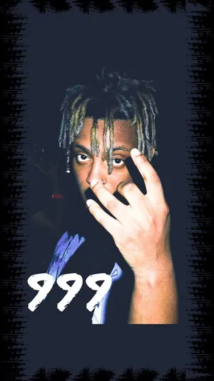 Juice Wrld Performing In Front Of A Neon-painted Wall Wallpaper